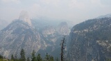 A smoky view from the top South Rim after a climb up Nevada Falls